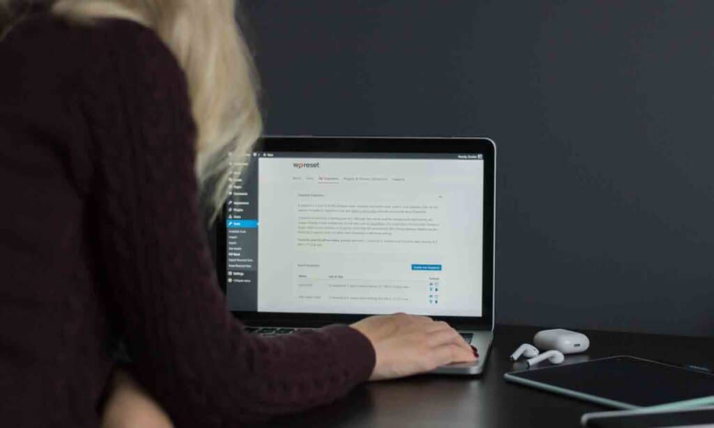 woman using WordPress on her computer
